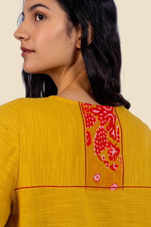 Dress in cotton with front buttons